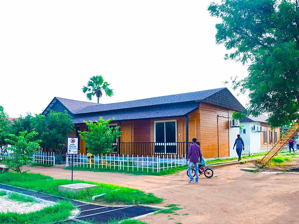 Lavender wooden single bedroom cottage at Go Ranch Resort near Yadagirigutta – cozy farm stay ideal for couples and weekend getaways