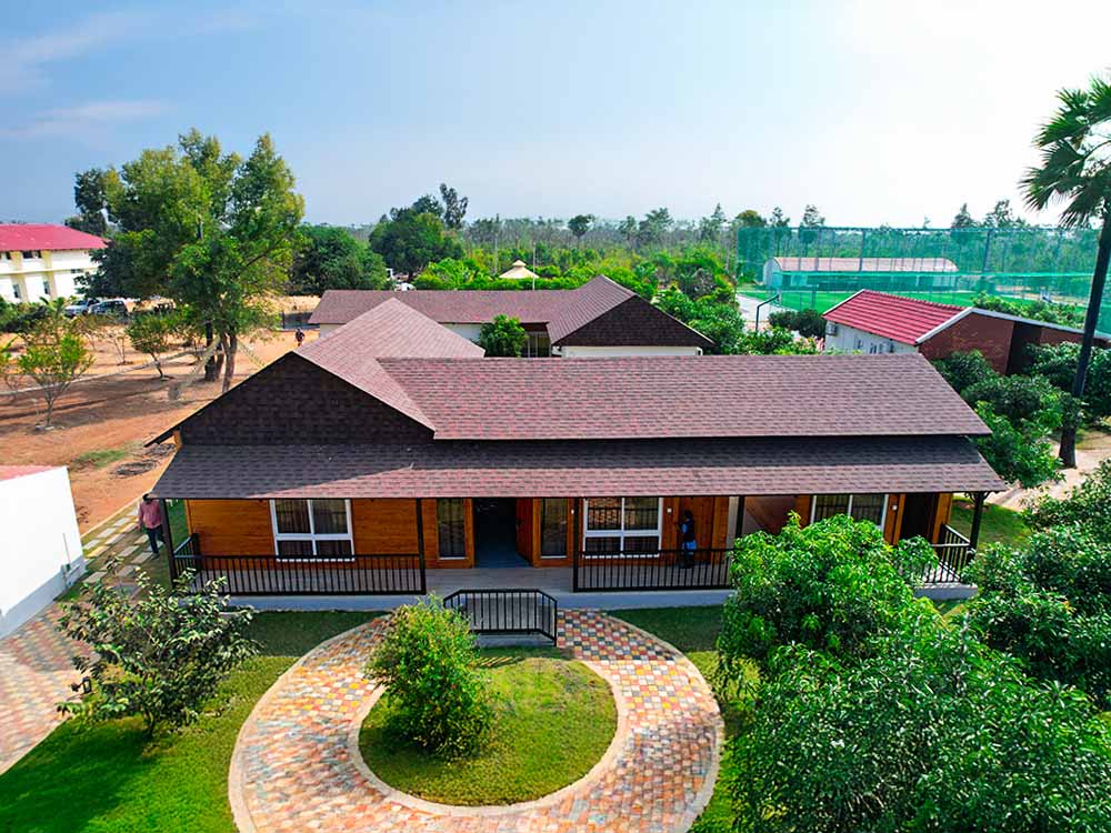 Marigold dormitory rooms at Go Ranch Resort near Hyderabad – spacious group accommodation for corporate teams, families, and all the events